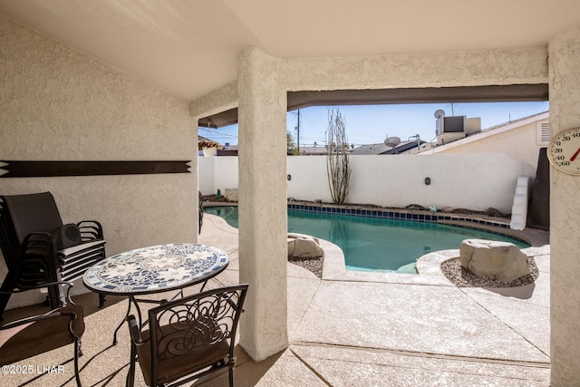 view of pool with a patio