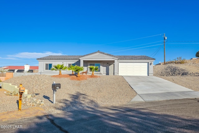 single story home with a tiled roof, a garage, concrete driveway, and stucco siding