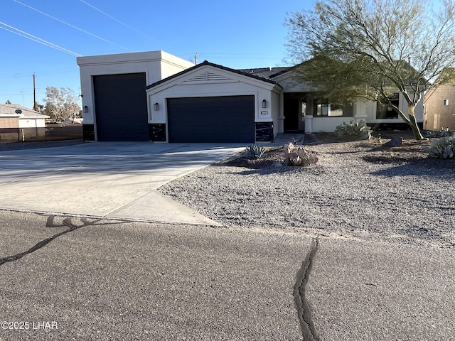 view of front of property featuring a garage