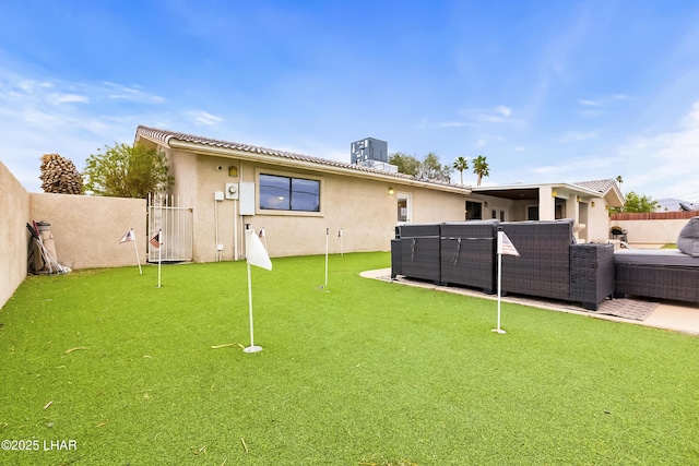 back of house with an outdoor hangout area