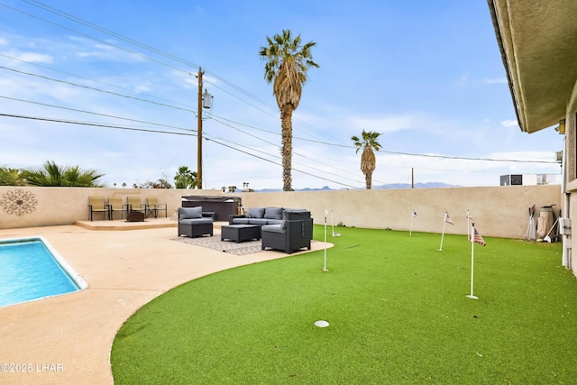 exterior space featuring an outdoor living space, a fenced in pool, and a patio area