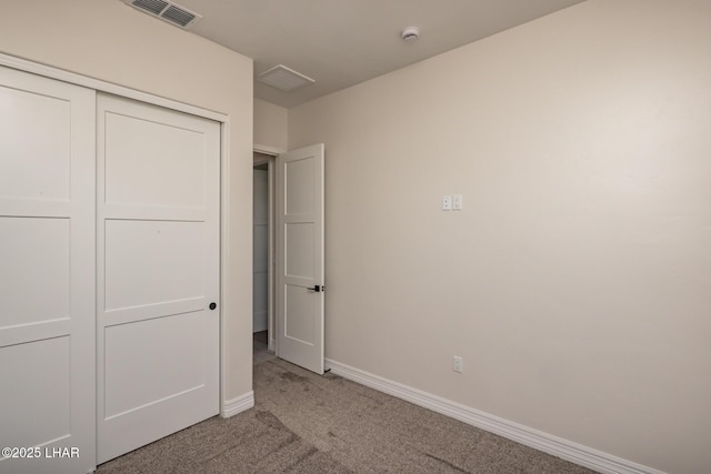 1650 E Sandra Dr, Lake Havasu City, AZ 86404 - unfurnished bedroom featuring light colored carpet, baseboards, and a closet