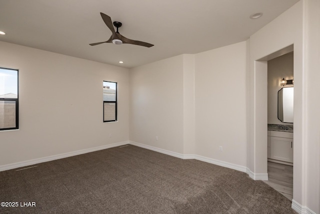 1650 E Sandra Dr, Lake Havasu City, AZ 86404 - empty room with ceiling fan, dark carpet, recessed lighting, and baseboards