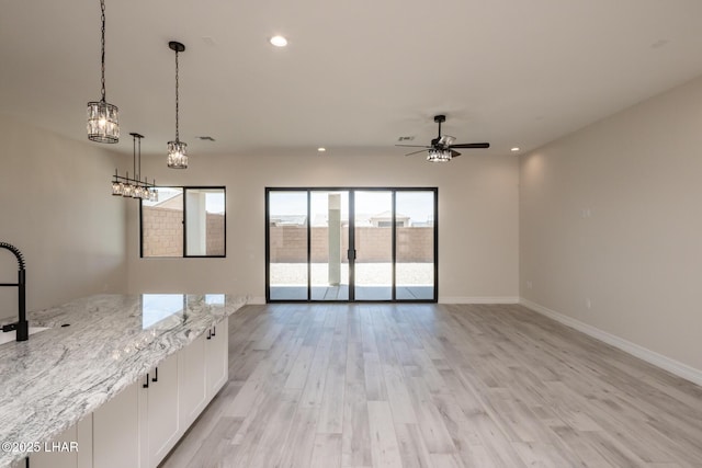1650 E Sandra Dr, Lake Havasu City, AZ 86404 - unfurnished living room featuring recessed lighting, light wood finished floors, ceiling fan, and baseboards