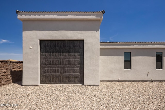 1650 E Sandra Dr, Lake Havasu City, AZ 86404 - view of home's exterior featuring stucco siding and a garage
