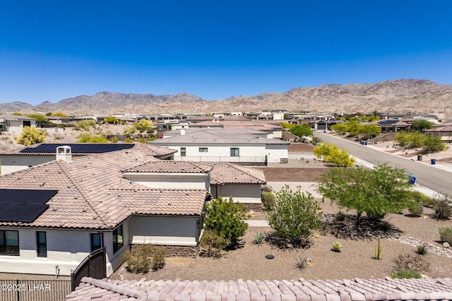 aerial view featuring a mountain view and a residential view