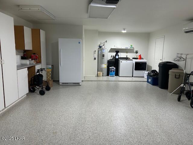 garage with water heater, an AC wall unit, washer and dryer, and white refrigerator