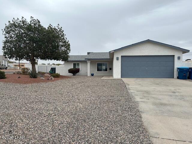 ranch-style house with a garage