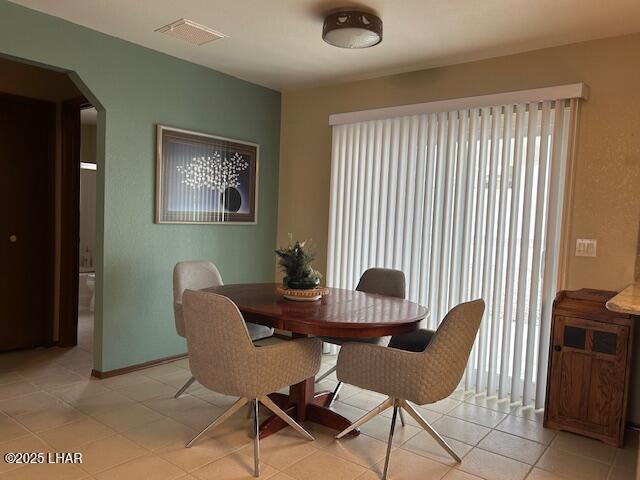 view of tiled dining area