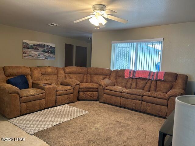 living room with ceiling fan