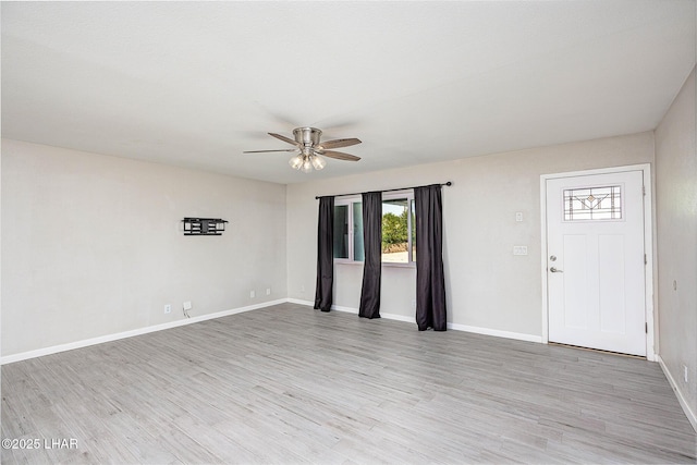1880 Biscayne Ln, Lake Havasu City, AZ 86403 - empty room featuring baseboards, ceiling fan, and light wood-style flooring