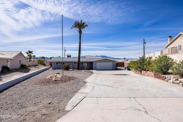 1880 Biscayne Ln, Lake Havasu City, AZ 86403 - ranch-style home featuring fence, driveway, and a garage