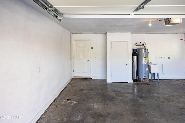 1880 Biscayne Ln, Lake Havasu City, AZ 86403 - garage with a sink, electric water heater, baseboards, and a garage door opener