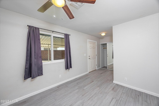 1880 Biscayne Ln, Lake Havasu City, AZ 86403 - empty room with baseboards, visible vents, wood finished floors, and a ceiling fan