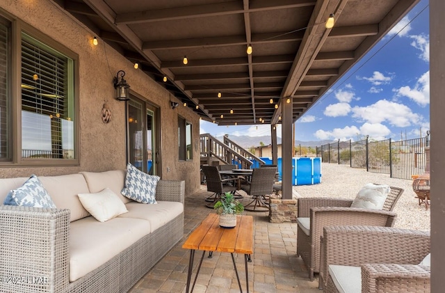 view of patio / terrace with outdoor lounge area and a fenced in pool