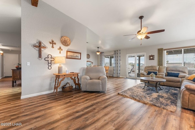 living room with hardwood / wood-style flooring and ceiling fan