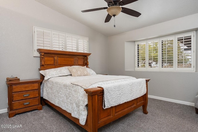 bedroom with lofted ceiling, light colored carpet, and ceiling fan