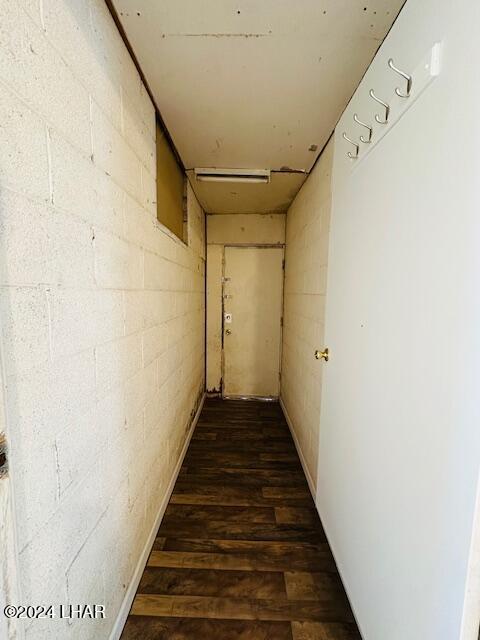 hall featuring dark wood-type flooring