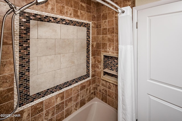 bathroom with shower / bath combination with curtain