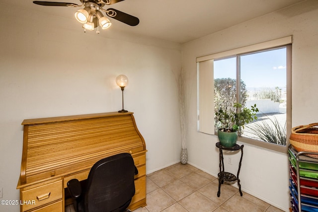 home office featuring ceiling fan and light tile patterned floors