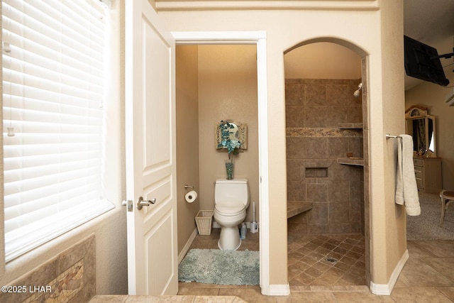 2780 Shasta Ln, Lake Havasu City, AZ 86403 - full bathroom with baseboards, a walk in shower, tile patterned floors, and toilet