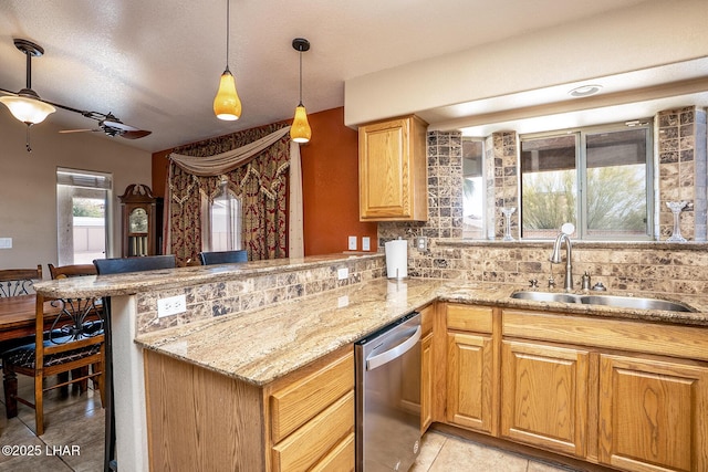2780 Shasta Ln, Lake Havasu City, AZ 86403 - kitchen featuring decorative backsplash, dishwasher, a sink, a peninsula, and light tile patterned flooring