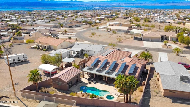 bird's eye view featuring a residential view and a mountain view