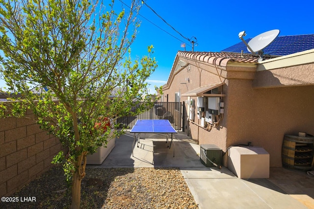 view of patio with a fenced backyard