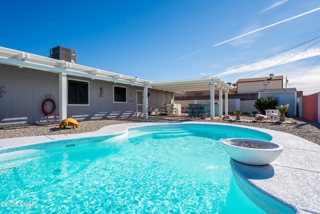 view of pool with central AC unit, a pergola, and a patio