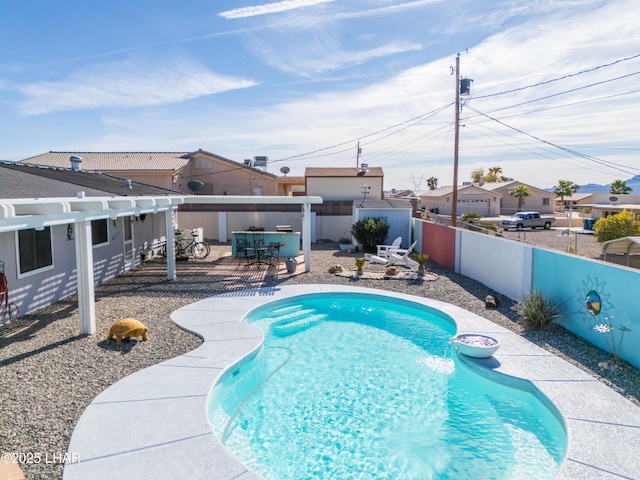 view of swimming pool with a patio area