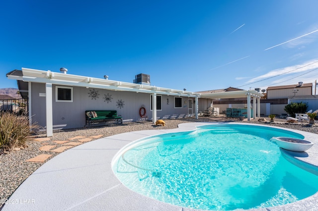 view of pool featuring a pergola and a patio area