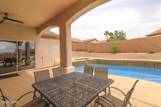 view of pool with ceiling fan, a fenced backyard, a patio, a fenced in pool, and outdoor dining area
