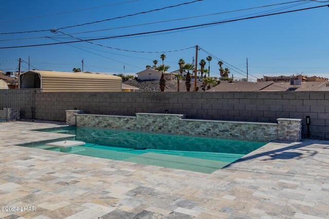 view of pool with a patio area