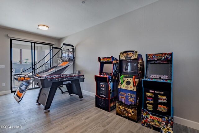 recreation room featuring hardwood / wood-style flooring