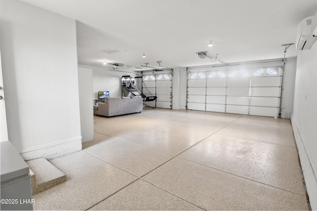 garage featuring a wall mounted air conditioner