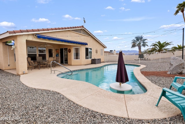 view of pool with a patio area, a fenced backyard, a fenced in pool, and central AC