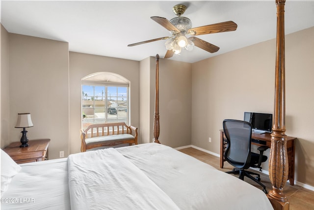 bedroom with tile patterned flooring, ceiling fan, and baseboards