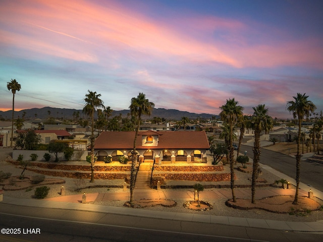 view of front of home featuring a mountain view