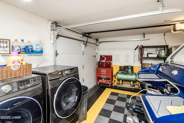 laundry area with washing machine and dryer