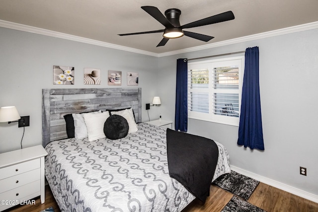 bedroom featuring ceiling fan, ornamental molding, and hardwood / wood-style floors