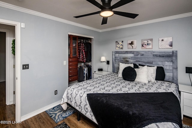 bedroom with crown molding and dark hardwood / wood-style floors