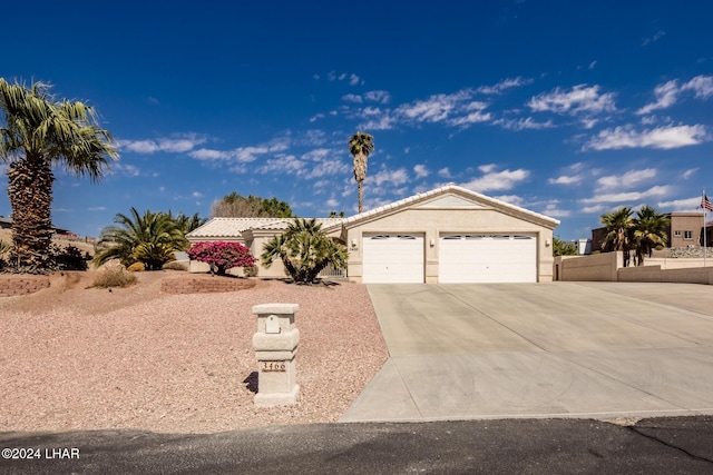 view of front of property with a garage