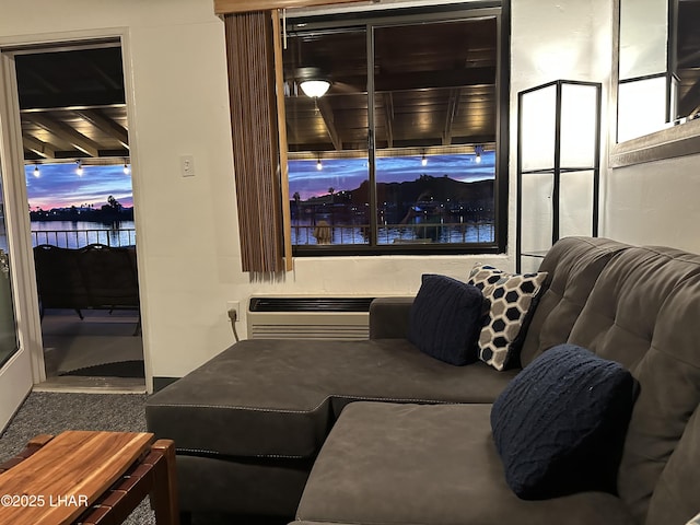 9378 Riverside Dr, Parker, AZ 85344 - living room with a wall unit AC and carpet