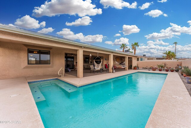 view of pool featuring a fenced in pool, a patio, and fence