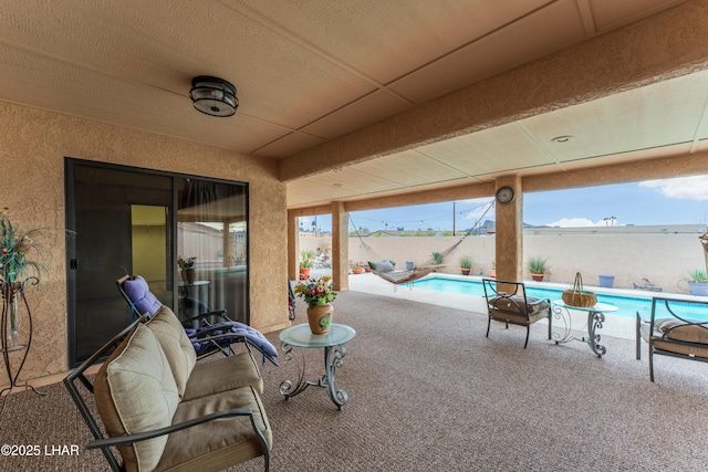 view of patio / terrace featuring a fenced in pool and a fenced backyard