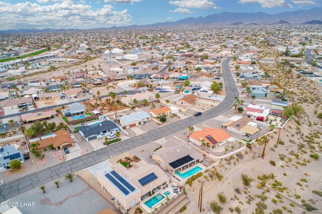 aerial view with a mountain view and a residential view