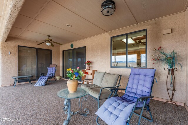 view of patio / terrace with ceiling fan