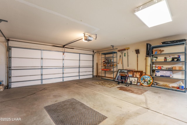 garage featuring a garage door opener