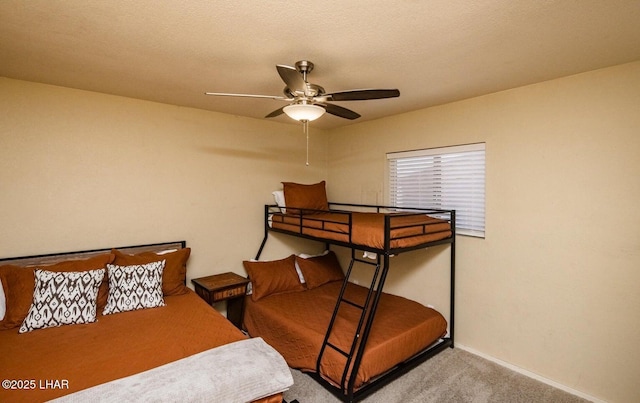 carpeted bedroom with a textured ceiling