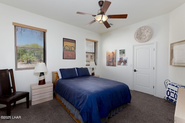 carpeted bedroom featuring vaulted ceiling and ceiling fan